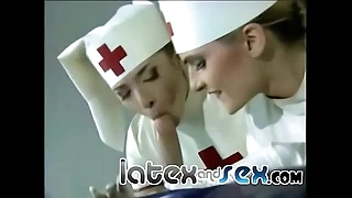 Latex nurses treat a rubber gas mask guy